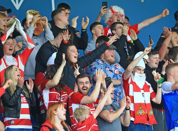 Doncaster Rovers fans are pictured at Oxford United on the final day of the season.