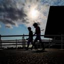 Jockeys make their way to the parade ring during last month's St Leger Festival at Doncaster Racecourse. Photo by Alan Crowhurst/Getty Images