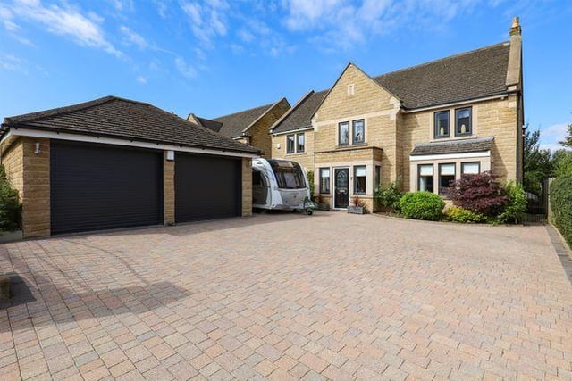 This five bedroom house has a conservatory with a log burner and underfloor heating.