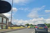 Police are at the scene at the junction of Carr House Road and White Rose Way.