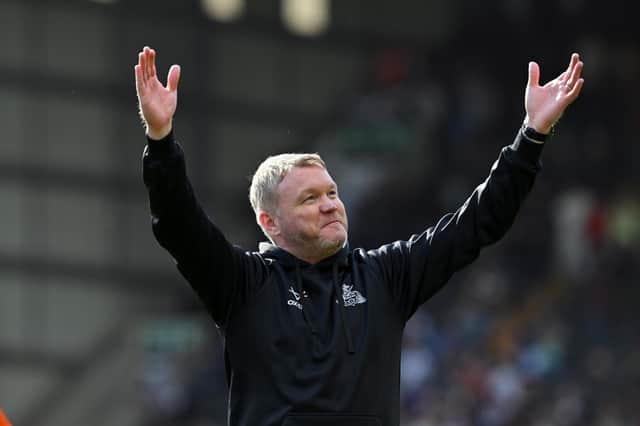 Grant McCann celebrates at full time at Notts County.