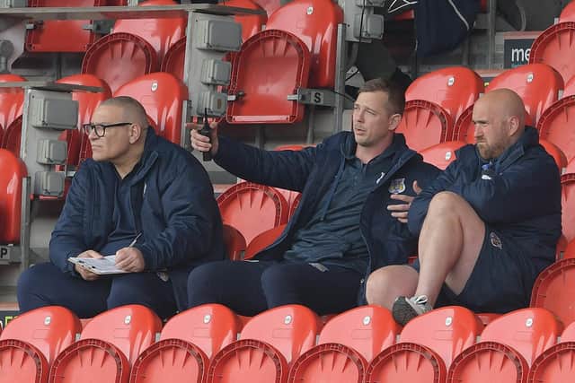 Dons head coach Richard Horne, centre, watches on. Picture: Howard Roe/AHPIX.com