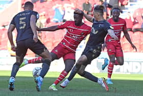 Jordy Hiwula and Joe Dodoo in action against Charlton Athletic.