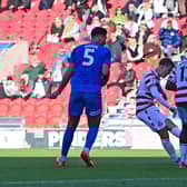 Max Woltman has a shot at goal against Leyton Orient.