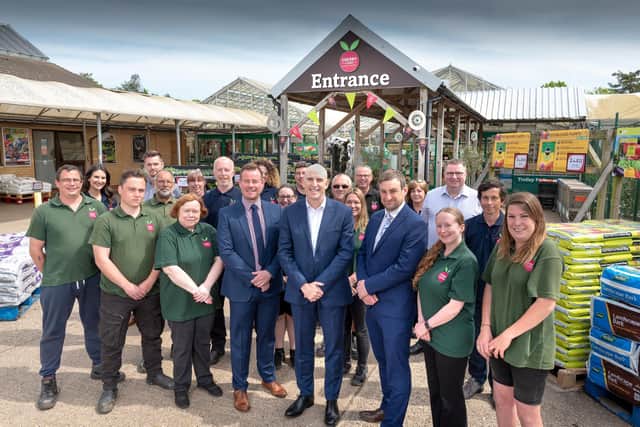 Cherry Lane CEO Nick Rubins (centre) with some of the team from head office and in-store. Picture: James Bass Photography