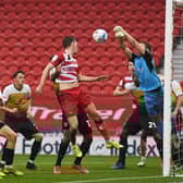 Joe Wright heads on goal. Picture: Howard Roe/AHPIX
