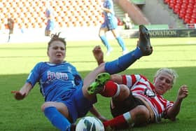 Millie Bright gets in a sliding tackle against Birmingham in her Belles days.  Picture: Malcolm Billingham
