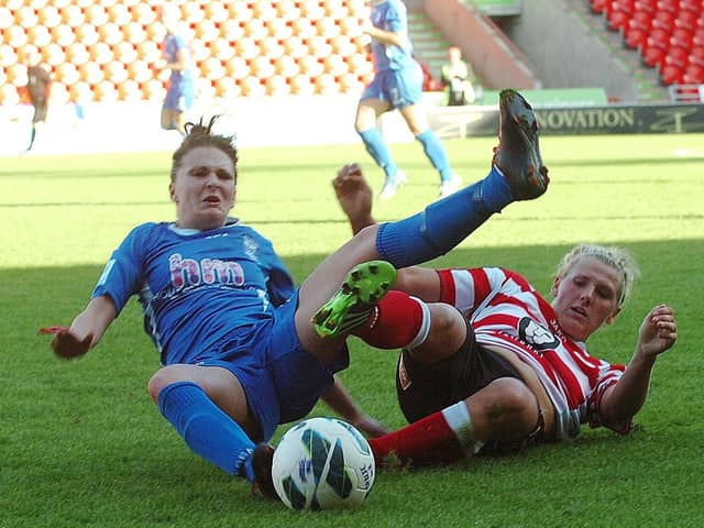 Millie Bright gets in a sliding tackle against Birmingham in her Belles days.  Picture: Malcolm Billingham