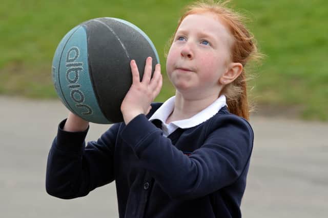 A Denaby Main pupil pictured taking part in Basketball, during Active dinner time. NDFP-09-03-21-DenabyMain 4-NMSY