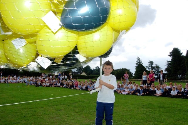 Pupils at Dunsville Primary School, Doncaster, celebrated the end of their sports day with a balloon race. Thomas Podmore-Finch releases the balloons, July 2007