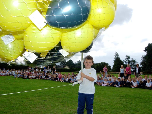 Pupils at Dunsville Primary School, Doncaster, celebrated the end of their sports day with a balloon race. Thomas Podmore-Finch releases the balloons, July 2007