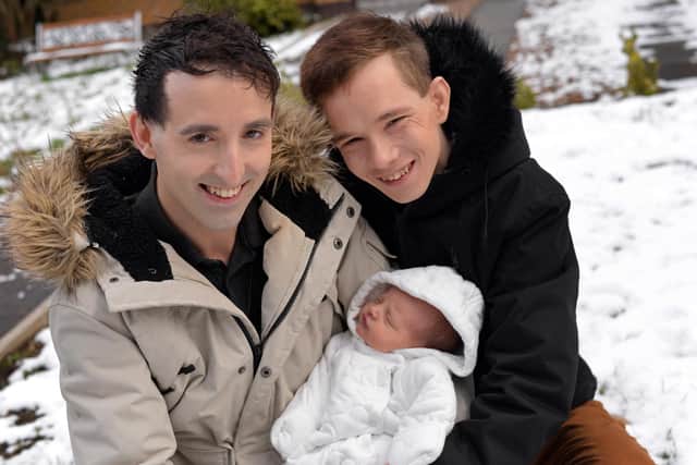 Harvey Cooper and Adam Williams, pictured with their son Jacob. Picture: NDFP-09-02-21-HarveyAdam 7-NMSY
