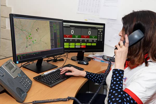 A dispatcher in Absolute Cabs' control room.