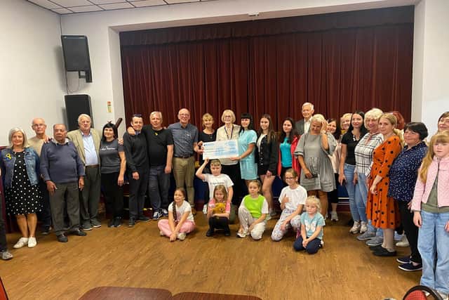 The Ukrainian Centre has been presented with a cheque to help refugees.