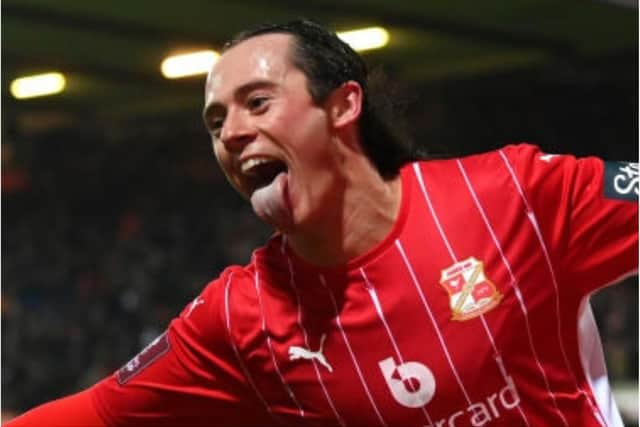 Harry McKirdy celebrates his goal against Manchester City. (Photo: Getty).