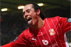 Harry McKirdy celebrates his goal against Manchester City. (Photo: Getty).