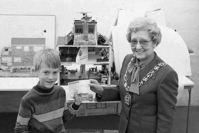 Seaburn's first Ideal Homes Exhibition with Mark Errington, 9, receiving a cheque from the Mayor of Sunderland, Councillor Annie Pratt, at the exhibition.  Mark was the first prize winner in a competition to design a house of the future.