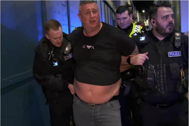 Police haul the man away after his arrest in Doncaster town centre. (Photo: Channel 4).