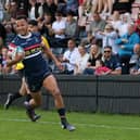 GOING OVER: Doncaster Knights' Jordan Olowofela races in to score against Coventry to the delight of the home fans. Picture: Jonathan Gawthorpe