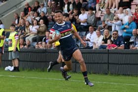 GOING OVER: Doncaster Knights' Jordan Olowofela races in to score against Coventry to the delight of the home fans. Picture: Jonathan Gawthorpe