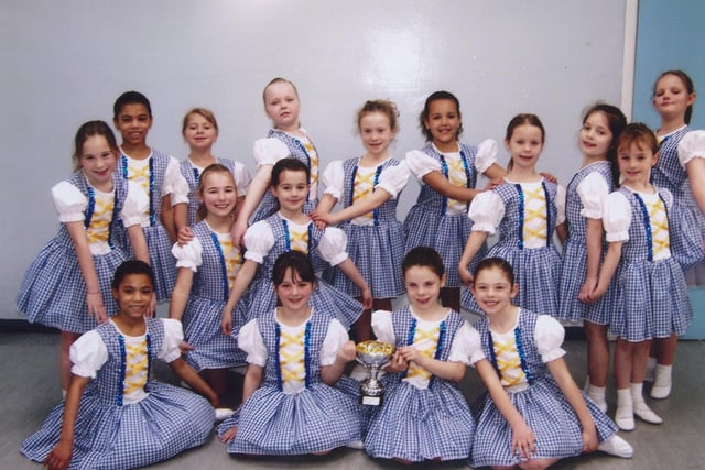 These young dancers in Brampton, Chesterfield, are very proud of winning a cup. But do you know which dance school they attended and what competition they took part in to win the cup?
