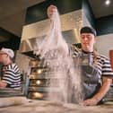 See the pizzas made fresh.