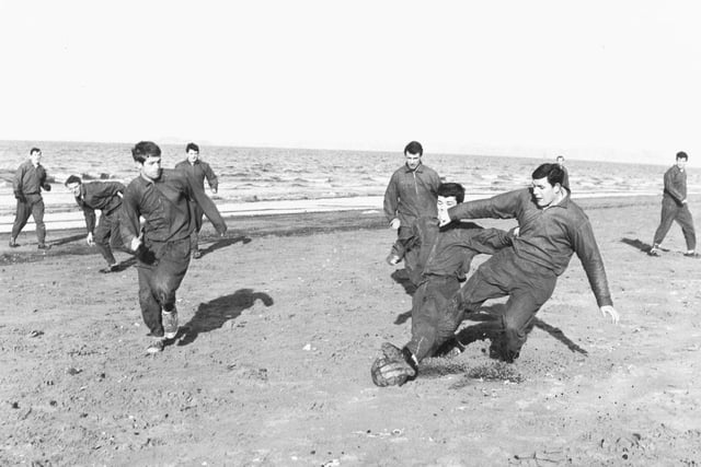 The Hibs players are put through their paces during a beach training session at Seafield in February 1966