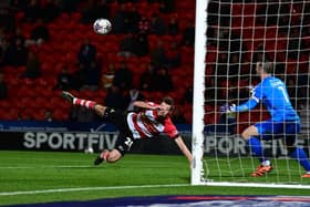 Joe Ironside puts the ball into the net.