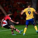 Tom Nixon puts the cross in for Doncaster Rovers.
