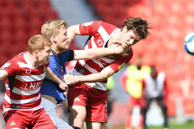 Joe Wright wins a header against Charlton. Picture: Howard Roe/AHPIX