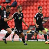 Doncaster's Kyle Hurst breaks through on goal against Crawley Town.