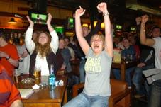Fans celebrate the winner at the Walkabout in Doncaster.