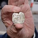 Metal detectors can unearth all sorts of treasures like this ID tag found in Doncaster
