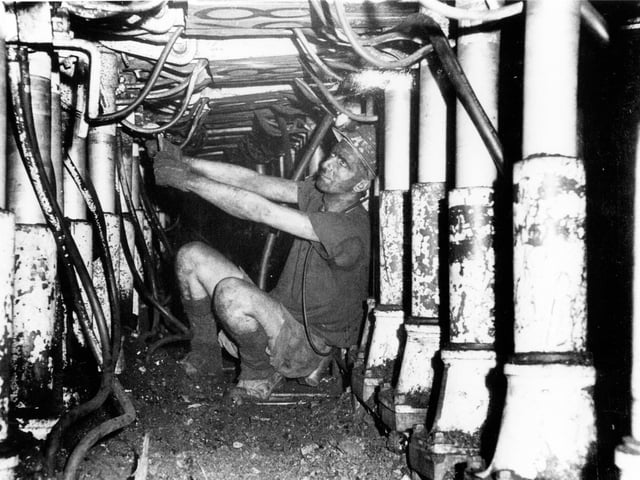 A miner works underground at Bentley Colliery