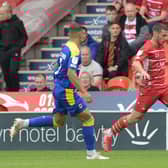 Tommy Rowe in action against AFC Wimbledon. Picture: Howard Roe/AHPIX LTD