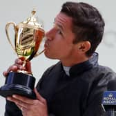 Frankie Dettori celebrates with the Gold Cup at Ascot after winning on Stradivarius last year. Photo: JULIAN FINNEY/POOL/AFP via Getty Images