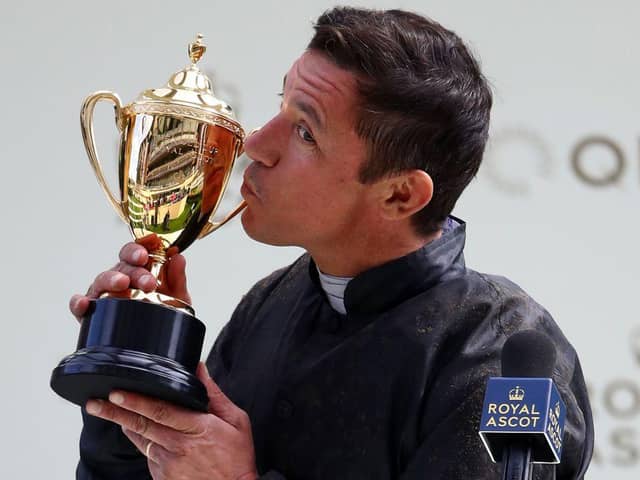 Frankie Dettori celebrates with the Gold Cup at Ascot after winning on Stradivarius last year. Photo: JULIAN FINNEY/POOL/AFP via Getty Images