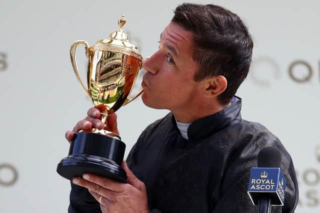 Frankie Dettori celebrates with the Gold Cup at Ascot after winning on Stradivarius last year. Photo: JULIAN FINNEY/POOL/AFP via Getty Images