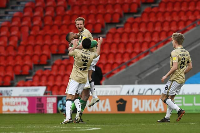 James Coppinger celebrates after scoring his late free kick against Hull City in the kit he designed to mark his 17 years with Rovers. Picture: Howard Roe/AHPIX