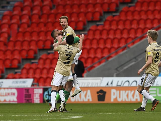 James Coppinger celebrates after scoring his late free kick against Hull City in the kit he designed to mark his 17 years with Rovers. Picture: Howard Roe/AHPIX