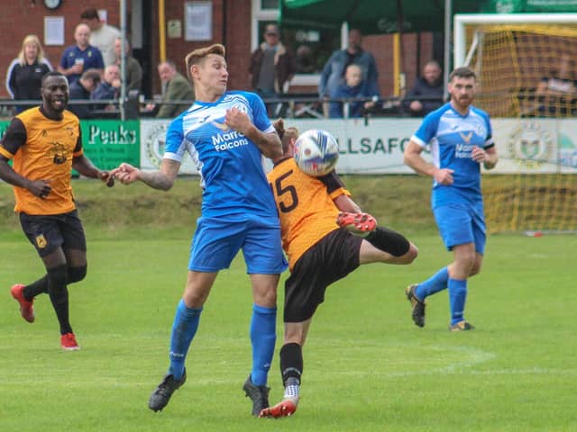 Action from Armthorpe Welfare's FA Vase clash at New Mills. Photo: Steve Pennock