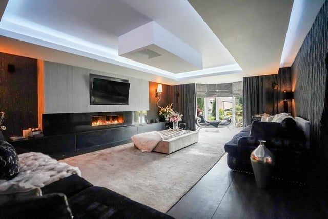 The lounge has a drop-down screen that can transform it to a cinema room.