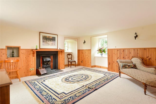 On the first floor is a further sitting room, which has an electric fire and views over the property's grounds.