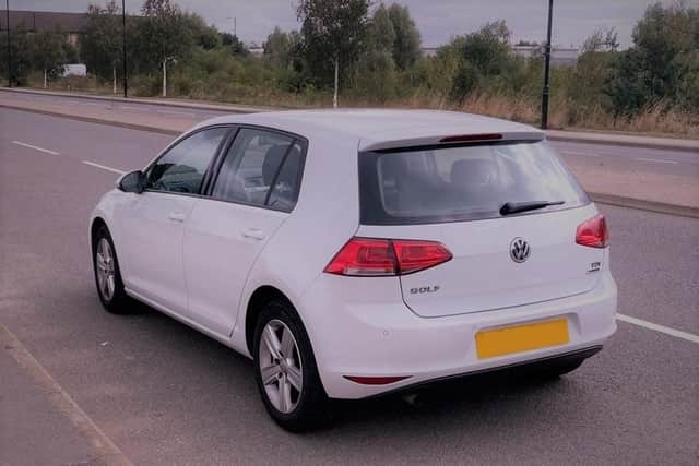 This car has false plates and three men were arrested.