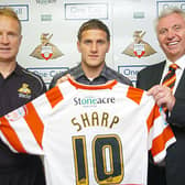 Billy Sharp with Rovers boss Sean O'Driscoll and chairman John Ryan after his club record transfer from Sheffield United