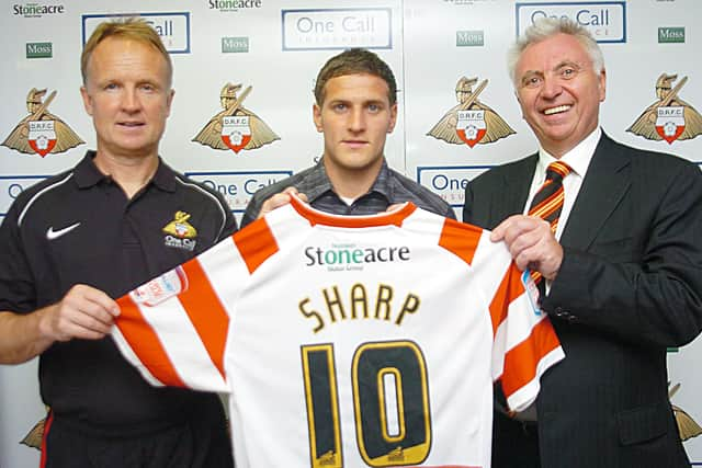 Billy Sharp with Rovers boss Sean O'Driscoll and chairman John Ryan after his club record transfer from Sheffield United