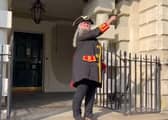 Town crier Anita Johnson makes the D-Day proclamation from the steps of the Mansion House.