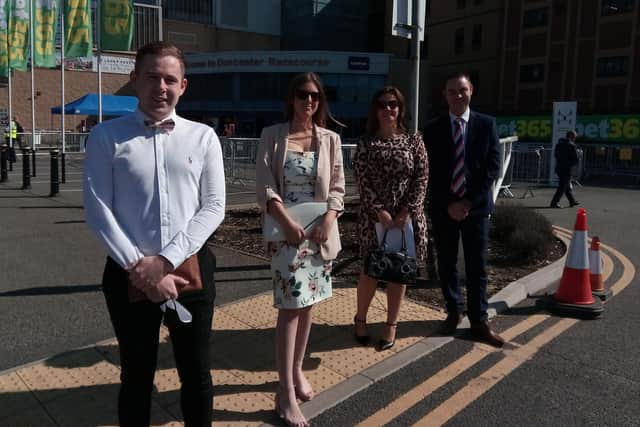 Michael Russell, of Goole, Rachel Oates, of Stryrrup, Emma Old, of Harworth, and Alex Mellor, of Goole at Doncaster Racecourse today for the St Leger Festival