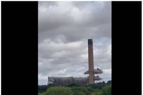 The 200m chimney is brought down in a controlled blast. (Photo/Video:  Callay Louse/White House Farm).