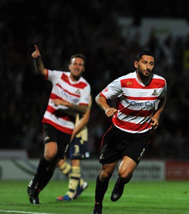 Billy Paynter celebrates a goal along with strike partner Chris Brown